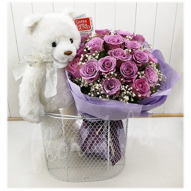 bouquet flowers and teddy bear