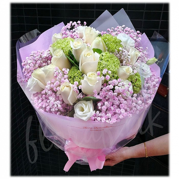 white rose and purple flower bouquet